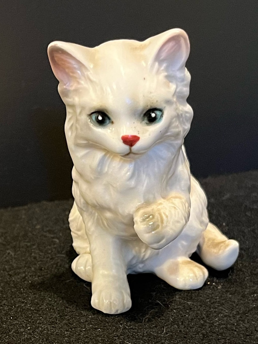 Porcelain White Cat Figurine with Pink Nose, Blue Eyes, and Touch of Grey